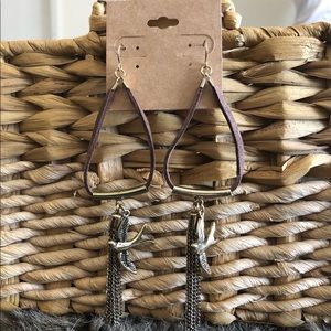 Hand crafted flying doves genuine leather earrings